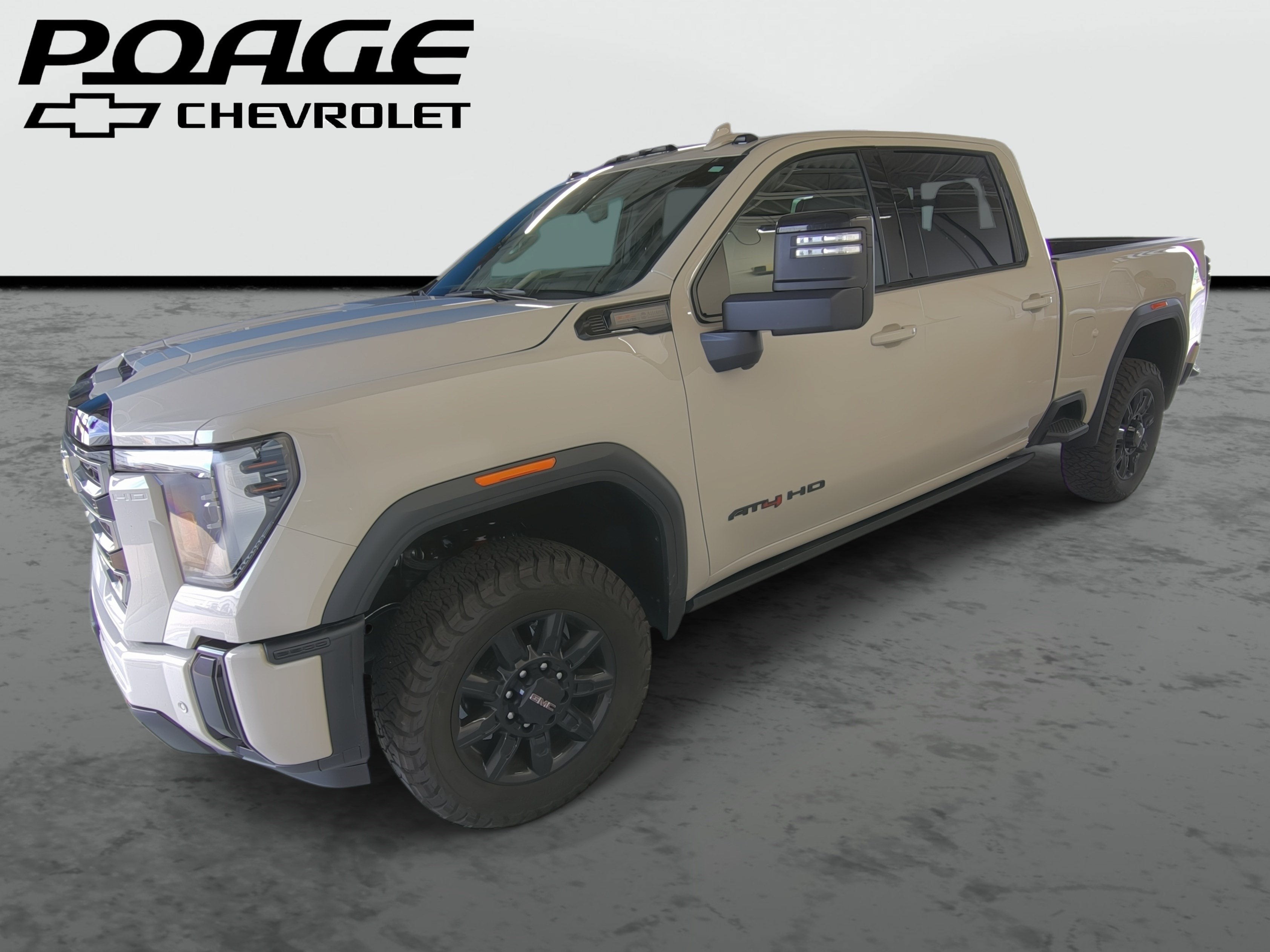 2026 GMC Sierra 2500 HD AT4 in Coastal Dune — front three-quarter view